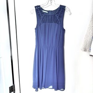 Maurice’s navy dress.